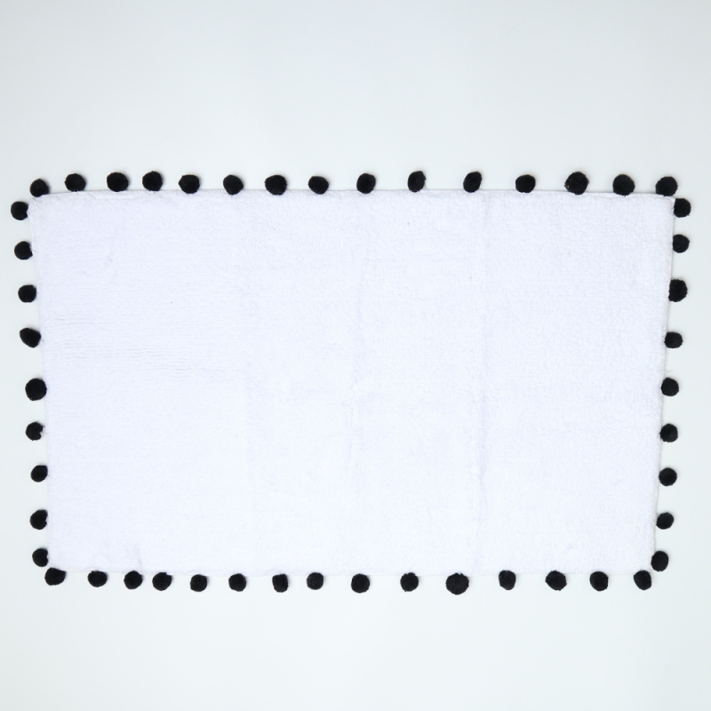 Badmat met pompons zwart